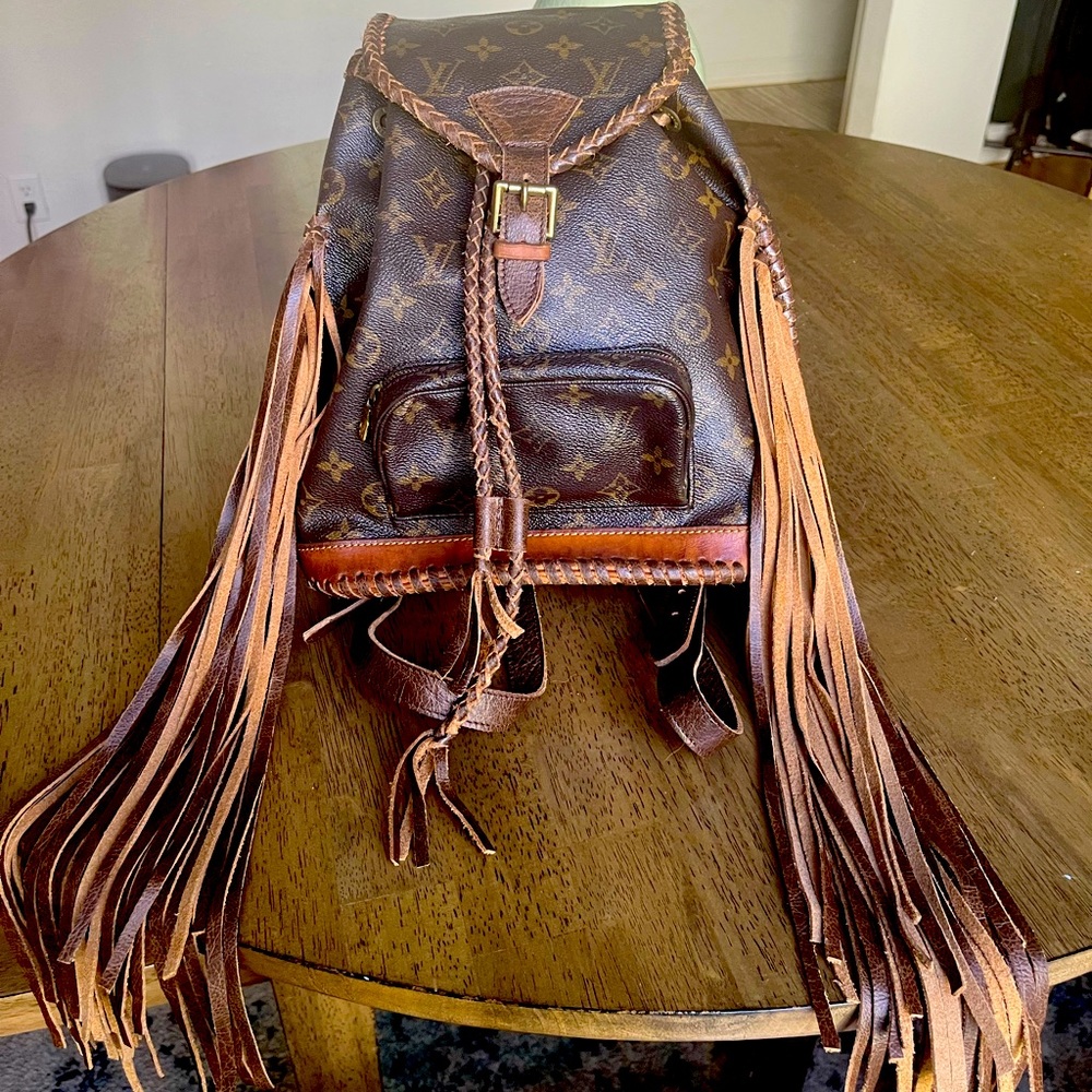 Louis Vuitton vintage Montsouris backpack western style with tassels